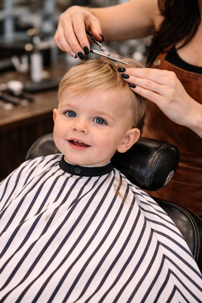 Kids first haircut at Ludmi Barber in Davie FL with a gentle, kid-friendly trim