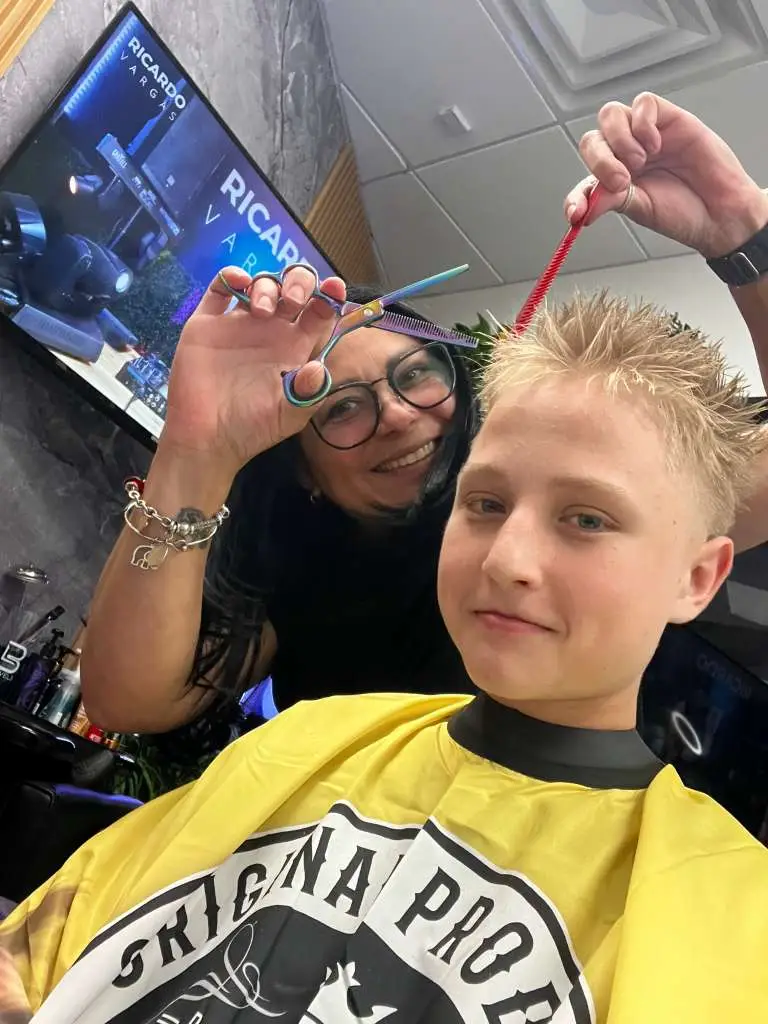 Mid fade haircut for men at Ludmi Barber Davie Florida